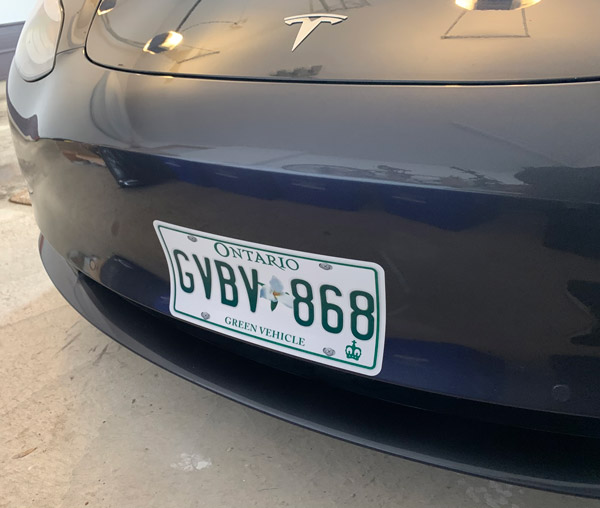 Adhesive license plate replica